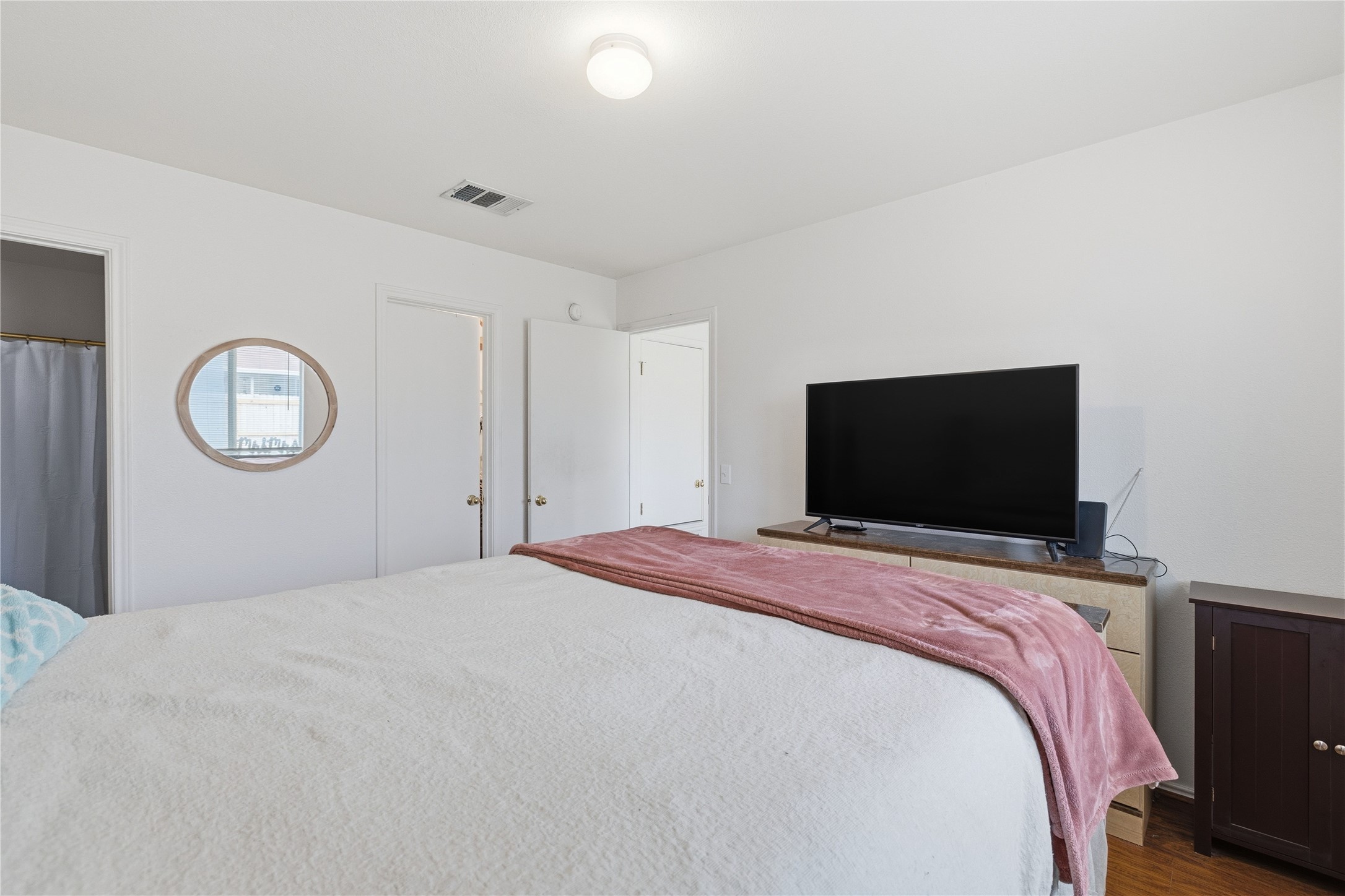 16112 Hamilton Point Circle Manor, TX 78653 - Photo 23 of 27 Bright interior space featuring white walls and a ceiling-mounted light fixture