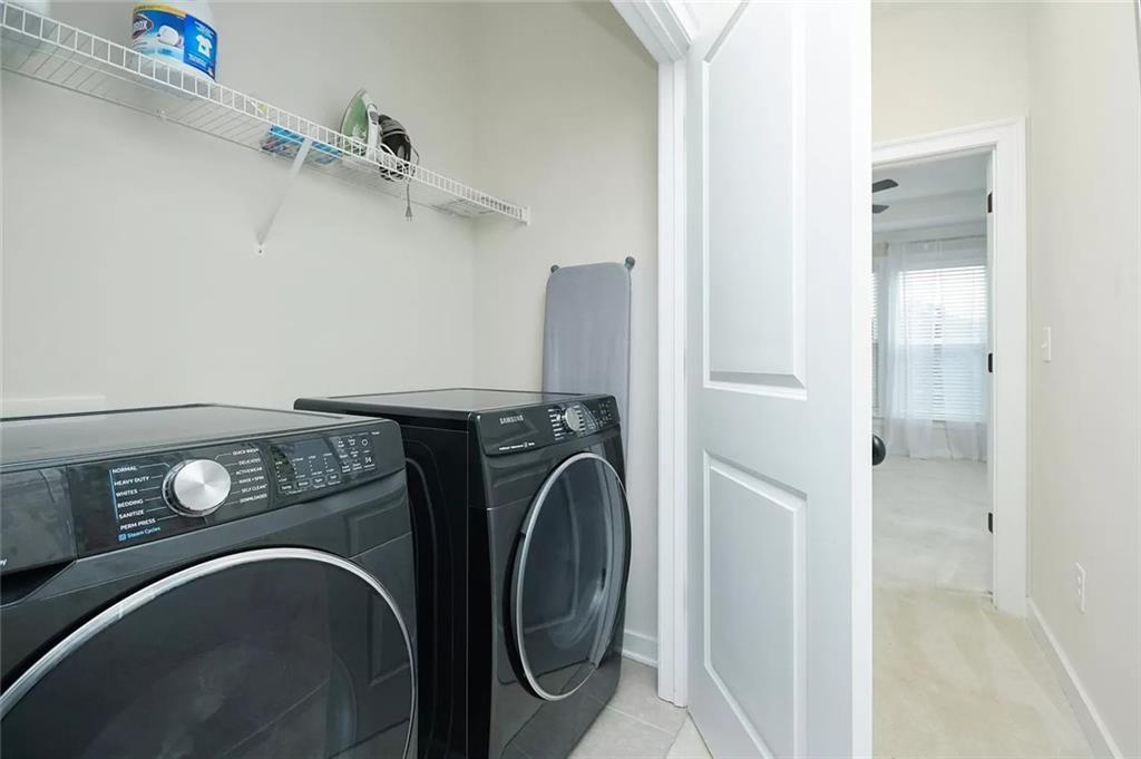 2048 Holtz Lane Atlanta, GA 30318 - Photo 19 of 27 a utility room with dryer and washer