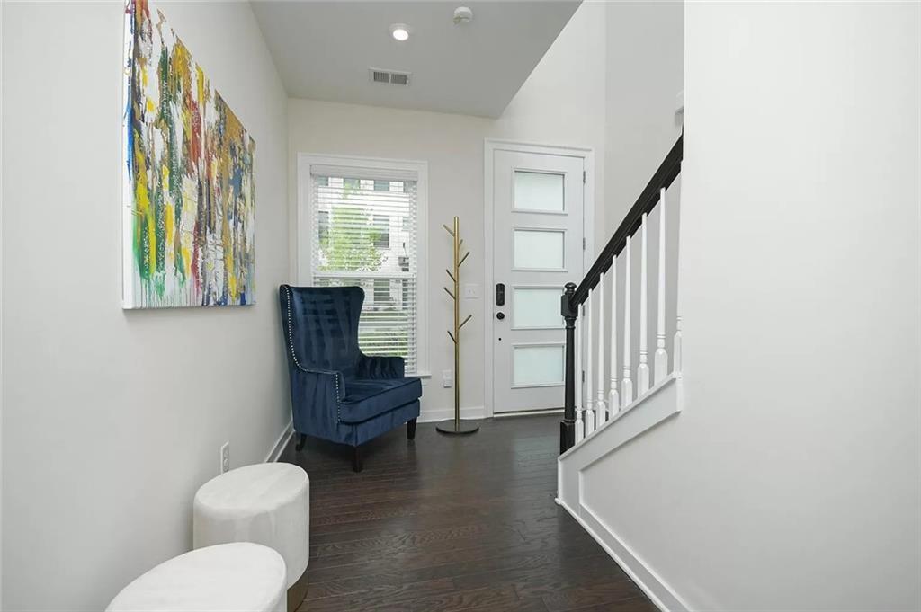 2048 Holtz Lane Atlanta, GA 30318 - Photo 4 of 27 a living room with furniture and a window