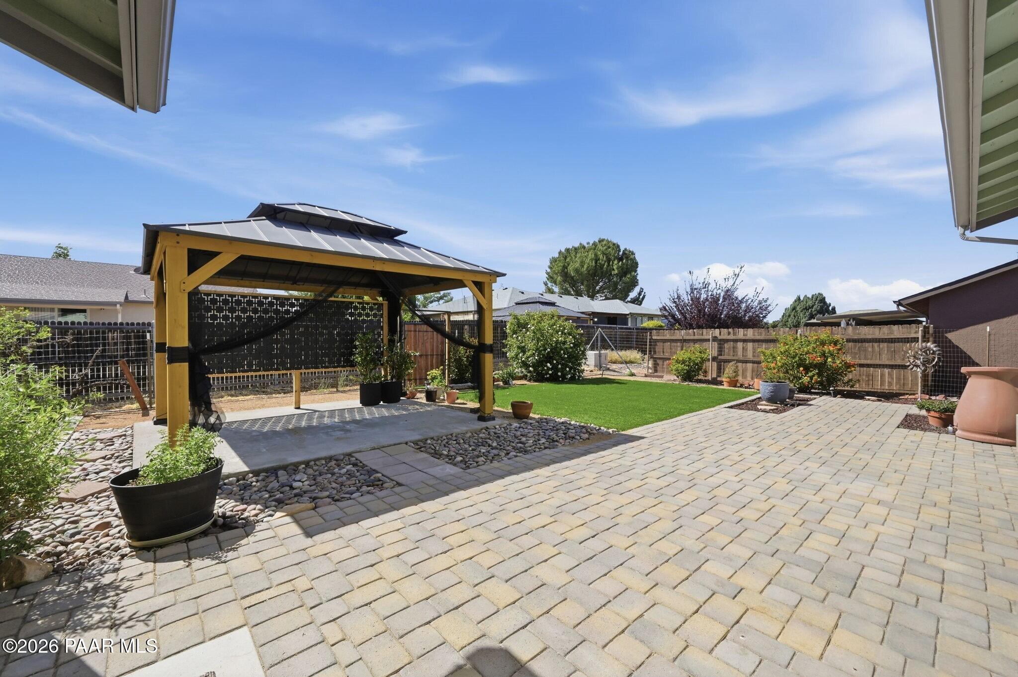 6040 North Rim Drive Prescott Valley, AZ 86314 - Photo 21 of 30 021_Fully Landscaped Backyard