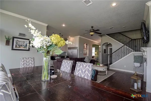 a view of living room and dining room
