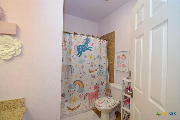 a view of a ocean with a beach