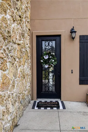 a view of a entryway door of the house