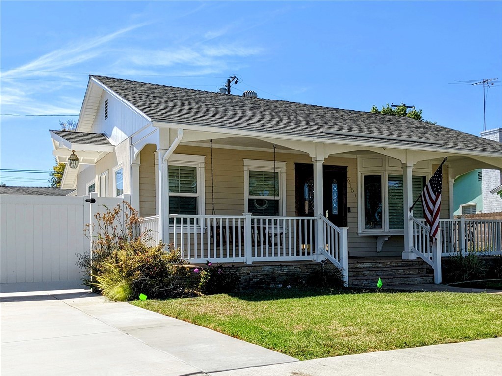 3157 Heather Road Long Beach, CA 90808 - Photo 1 of 1 a front view of a house with garden