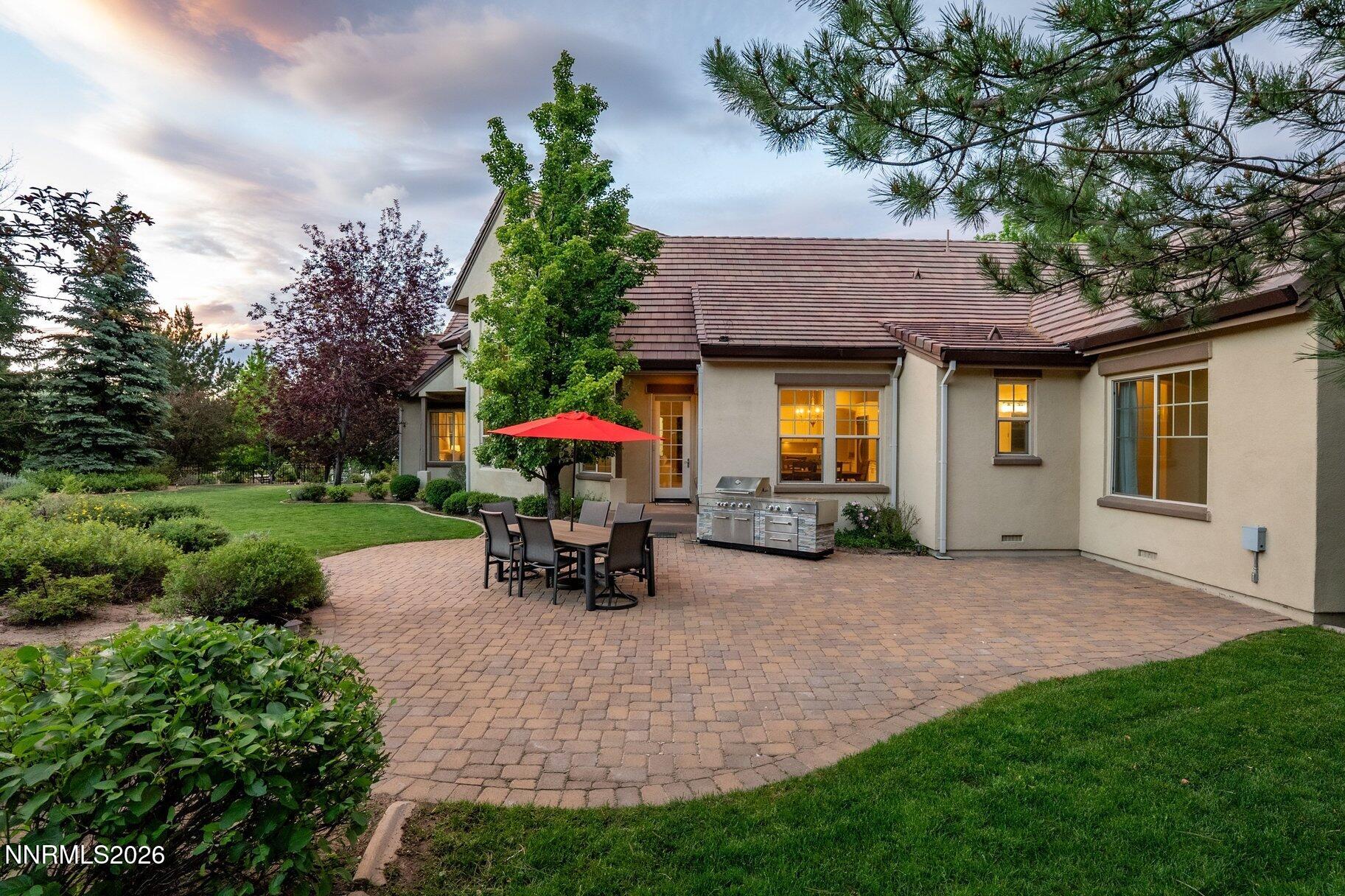 16925 Rue Du Parc Reno, NV 89511 - Photo 4 of 34 a view of a house with patio and a garden