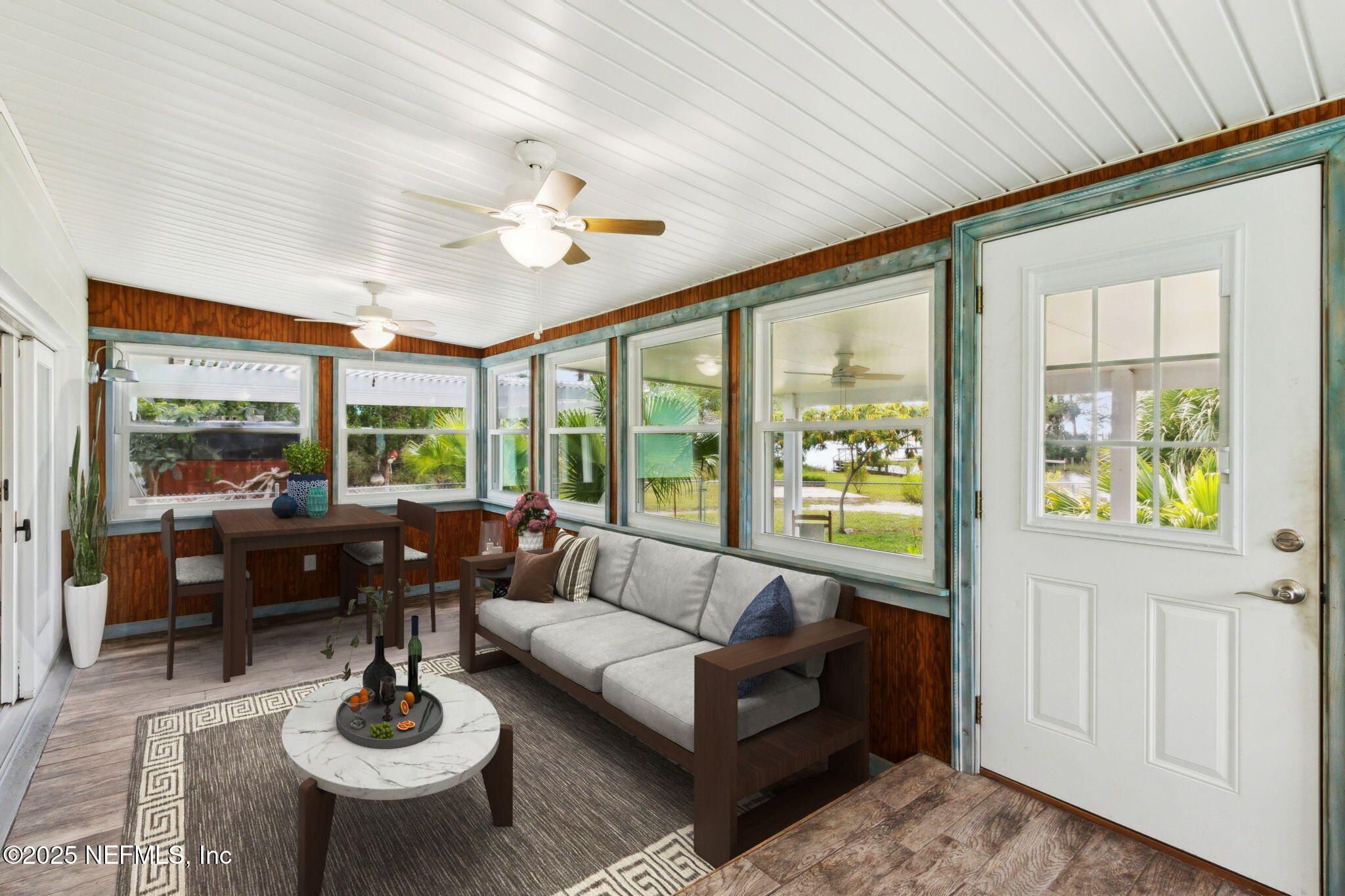 16062 Shark Road West Jacksonville, FL 32226 - Photo 22 of 43 a living room with furniture and a large window