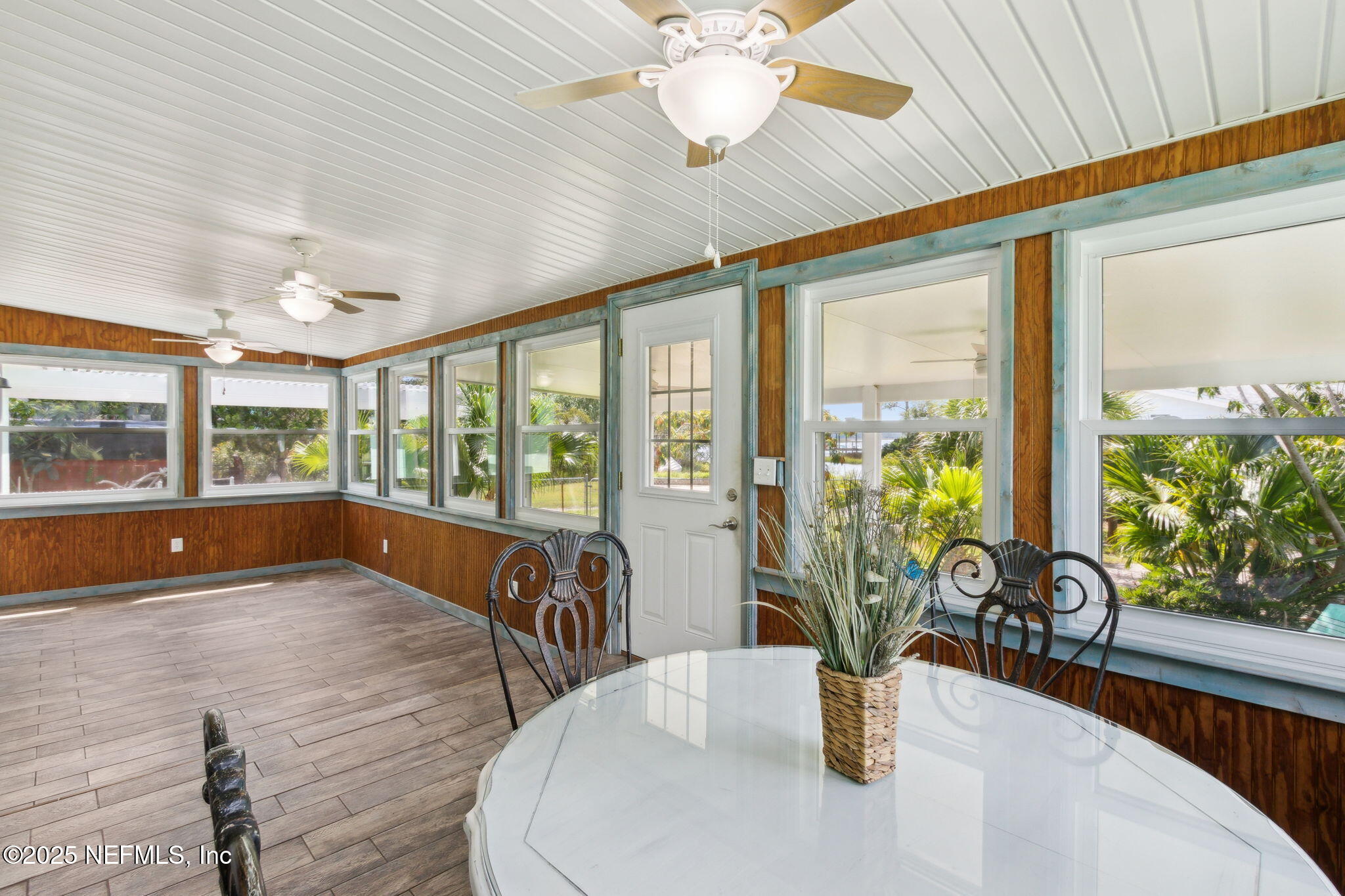 16062 Shark Road West Jacksonville, FL 32226 - Photo 24 of 43 a view of a dining room with furniture water view and wooden floor