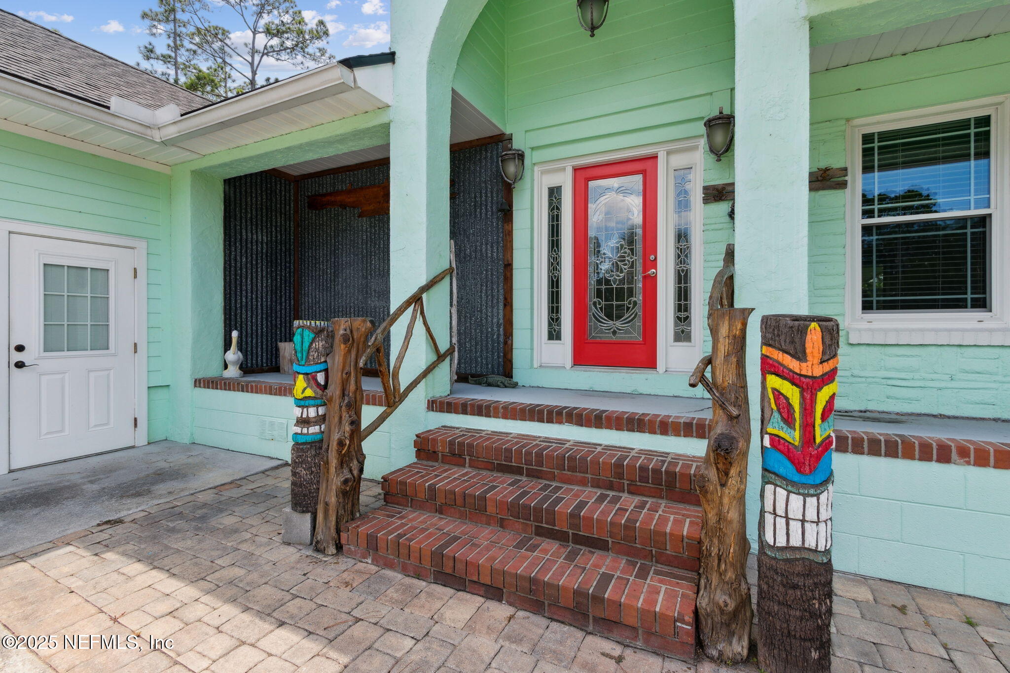 16062 Shark Road West Jacksonville, FL 32226 - Photo 6 of 43 a front view of a house with a garage