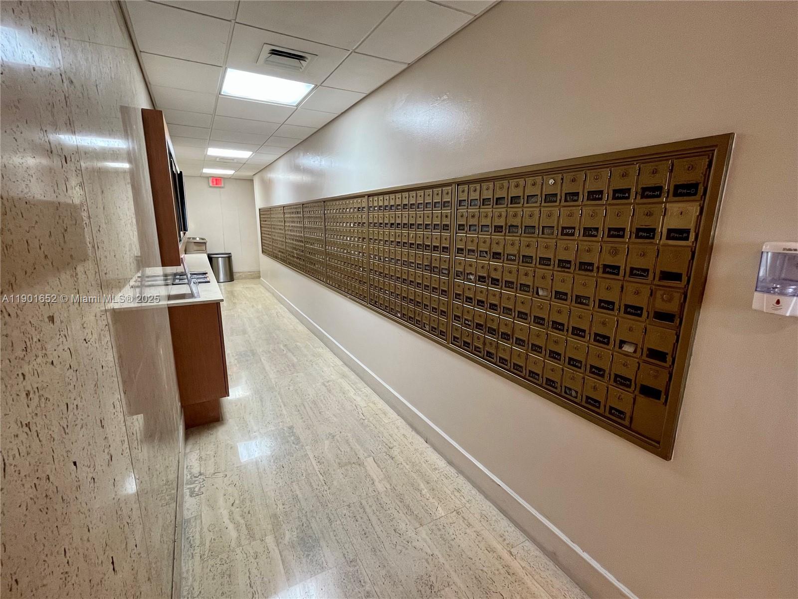 2899 Collins Avenue, Unit 1414 Miami Beach, FL 33140 - Photo 26 of 26 a view of a room with wooden floor
