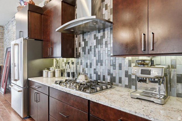 987 East Deer Arch Lane Draper, UT 84020 - Photo 13 of 46 Kitchen with gas range and commercial grade hood.
