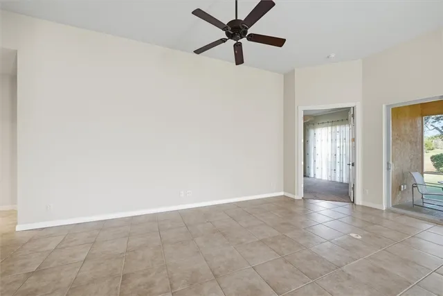 a view of an empty room with a bathroom