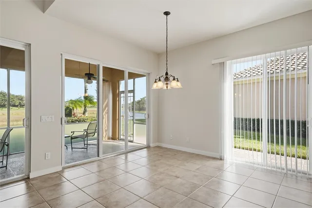 a bathroom with a bathtub a sink and a window