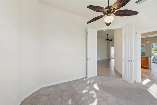 a kitchen with stainless steel appliances a refrigerator sink and cabinets