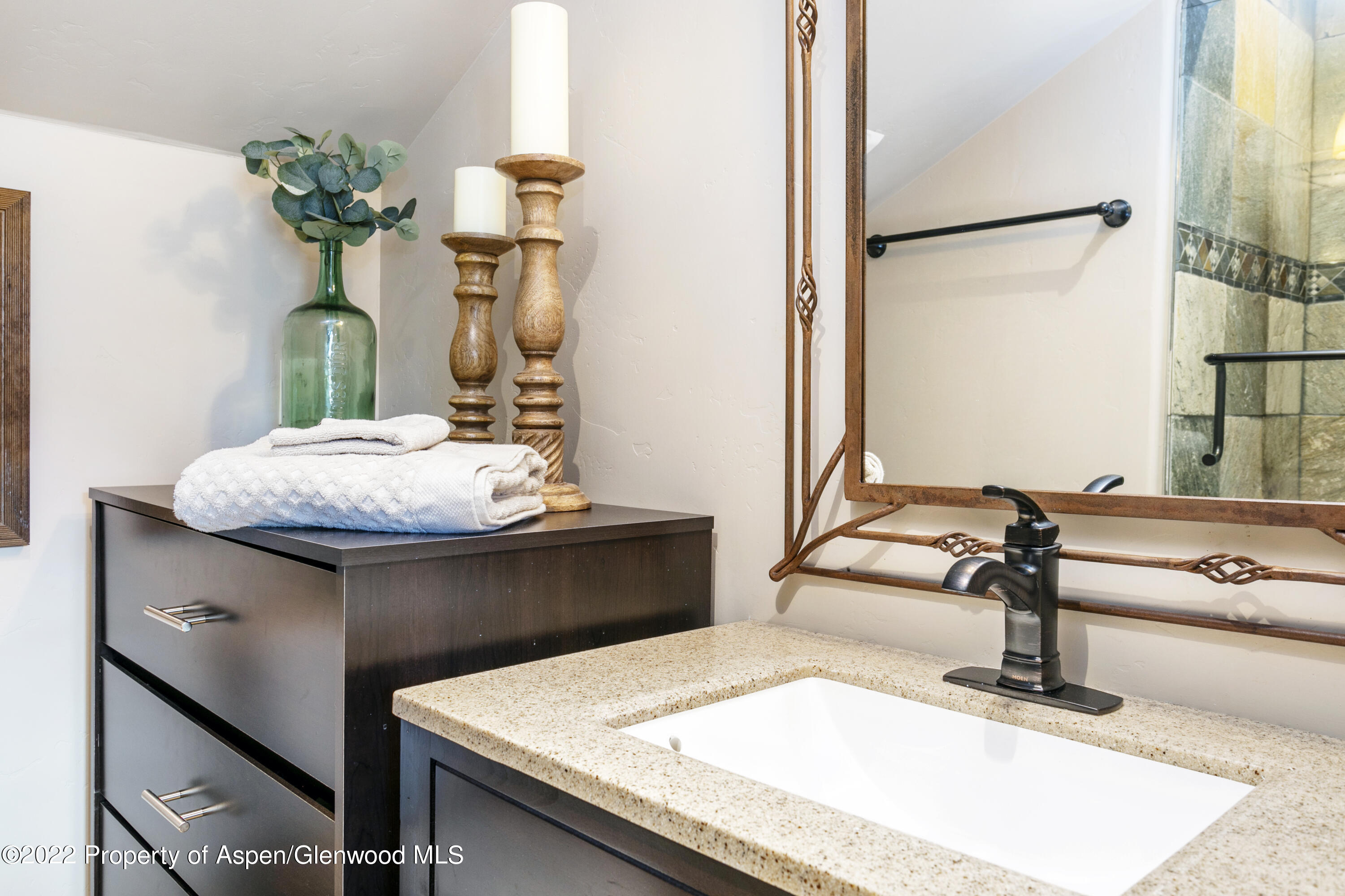 850 Main Street, Unit B Minturn, CO 81645 - Photo 18 of 24 a bathroom with a sink and a mirror
