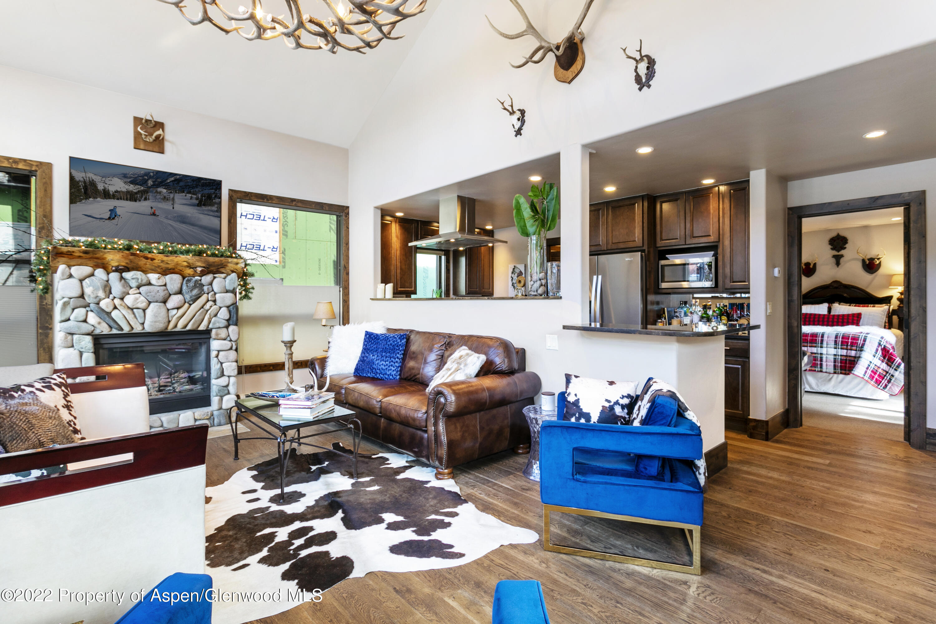 850 Main Street, Unit B Minturn, CO 81645 - Photo 6 of 24 a living room with furniture and a fireplace