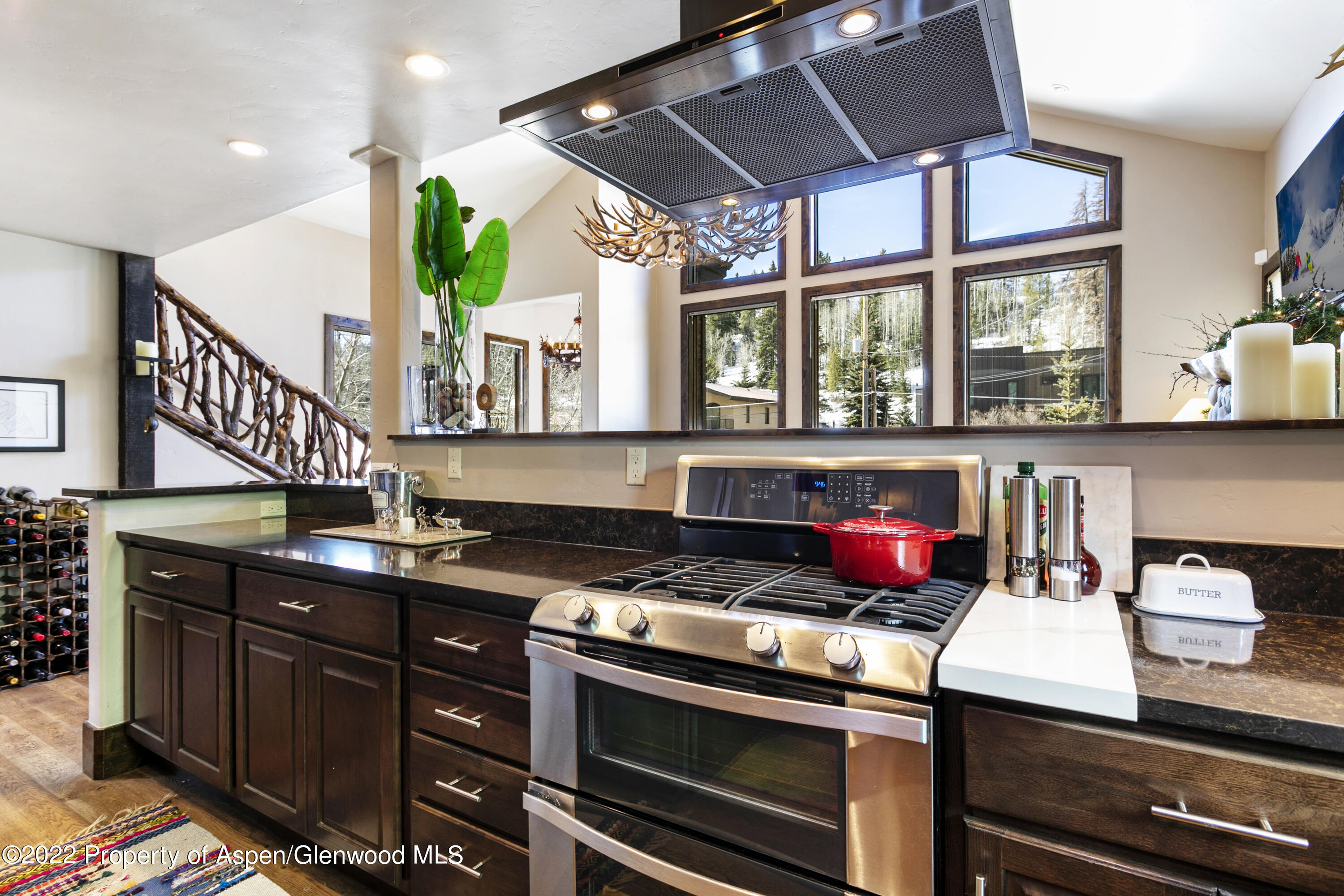 850 Main Street, Unit B Minturn, CO 81645 - Photo 8 of 24 a kitchen with a stove and a microwave