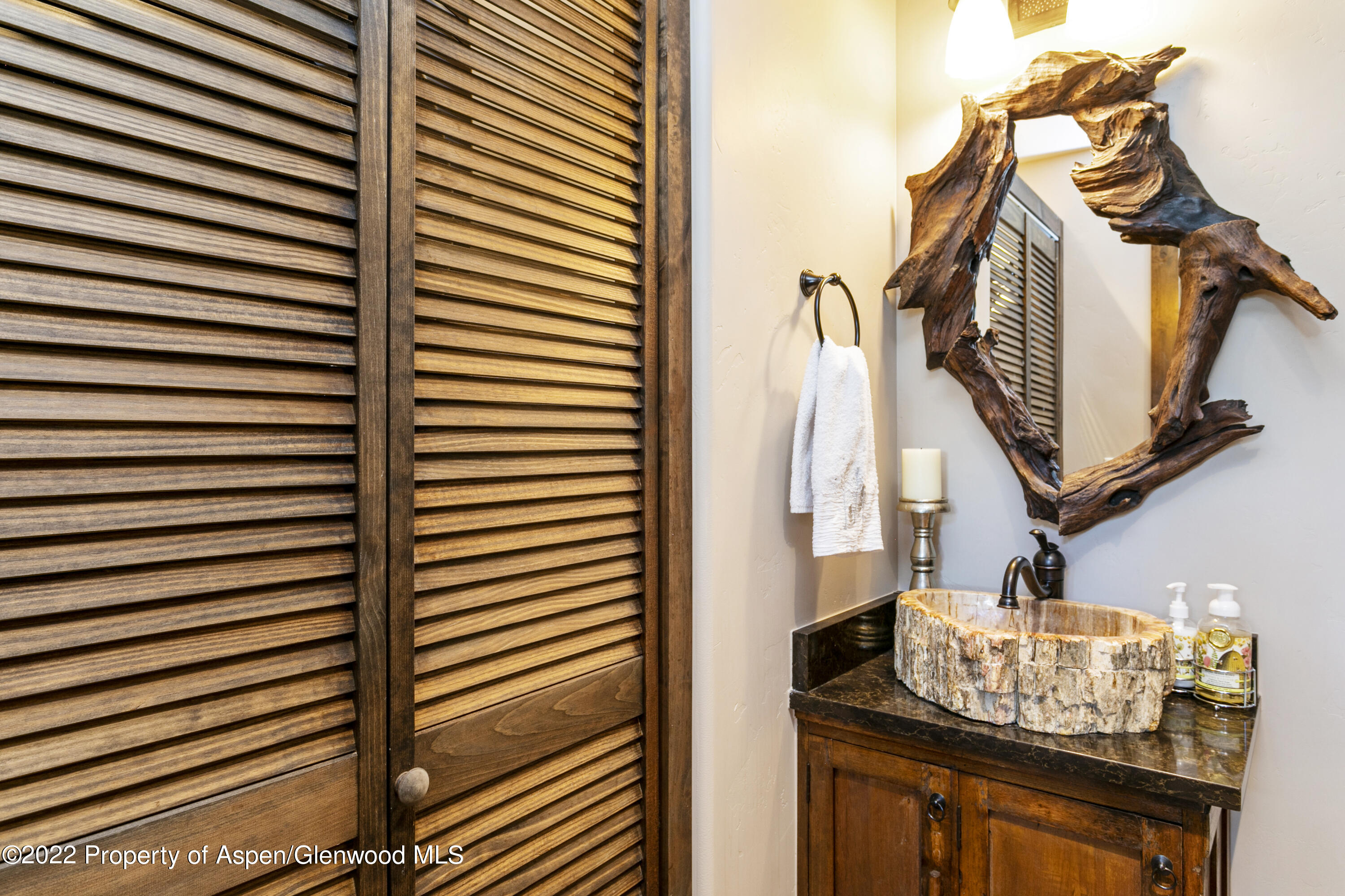 850 Main Street, Unit B Minturn, CO 81645 - Photo 9 of 24 a bathroom with a sink and a mirror