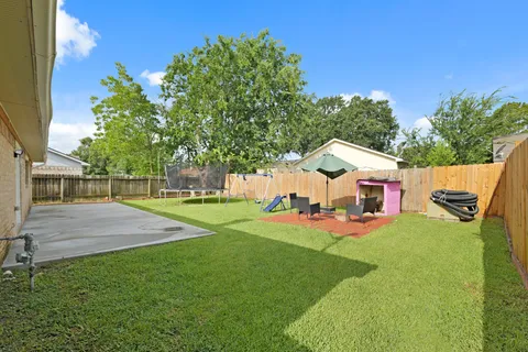swimming pool view with a outdoor seating