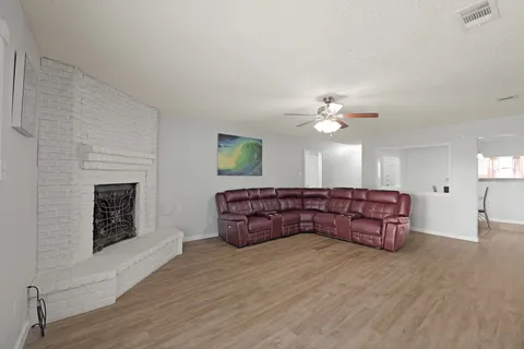 a bed room with furniture and a chandelier