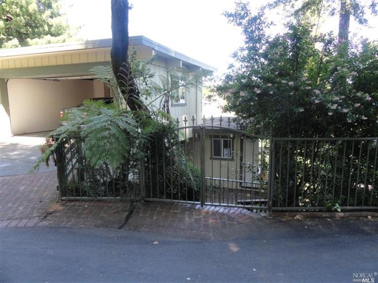 300 Hillside Avenue Mill Valley, CA 94941 - Photo 1 of 1 a house with a tree in front of it