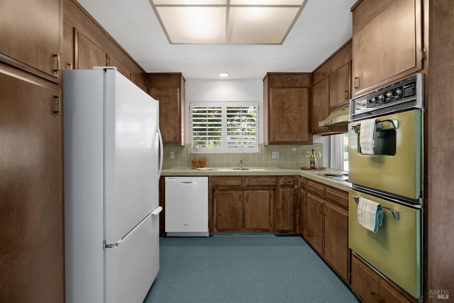 2904 Jason Drive Santa Rosa, CA 95405 - Photo 14 of 33 a kitchen with stainless steel appliances granite countertop a refrigerator a stove and a sink