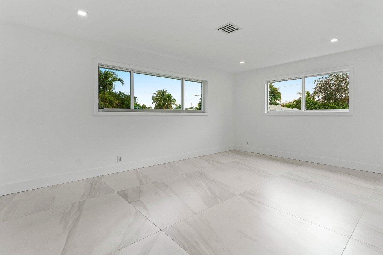 902 Southwest 27th Place Boynton Beach, FL 33435 - Photo 24 of 52 a view of room with window