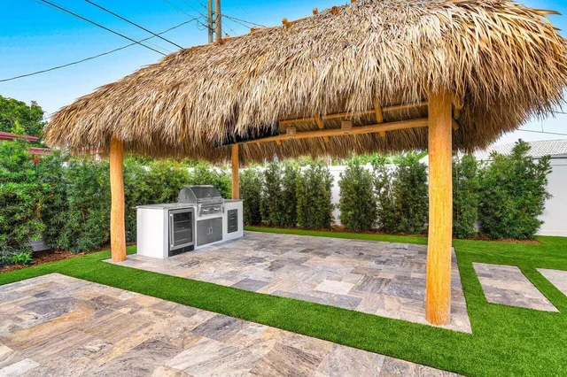 a view of a swimming pool with a patio