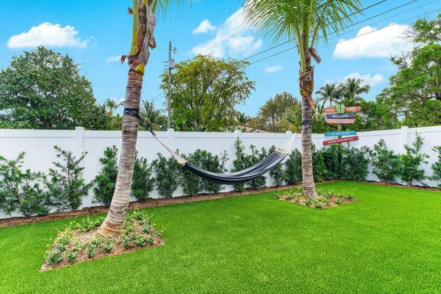 a view of a swimming pool with a patio