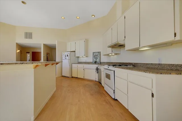 a bathroom with a sink and a window
