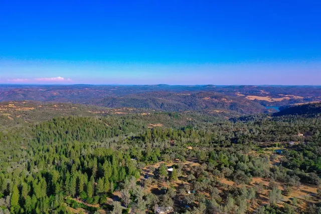 a bedroom with bed and window