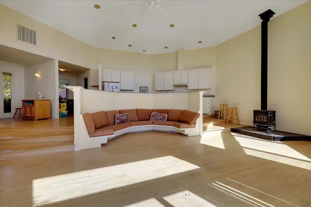 a living room with furniture and a table