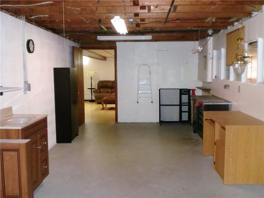290 Manor Road Wexford, PA 15090 - Photo 22 of 25 The "additional room" shown here measures 24x11 and provides a great space for your workshop, storage, crafts or exercise equipment. (The vanity is not hooked up and will be removed.)