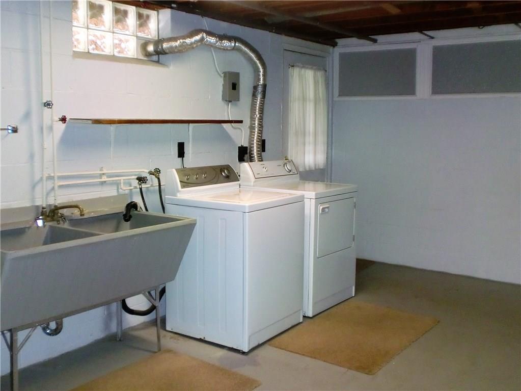 290 Manor Road Wexford, PA 15090 - Photo 24 of 25 The laundry room is a generous 20x12 and the Washer and Dryer is included! The door opens to the back yard, under the deck.