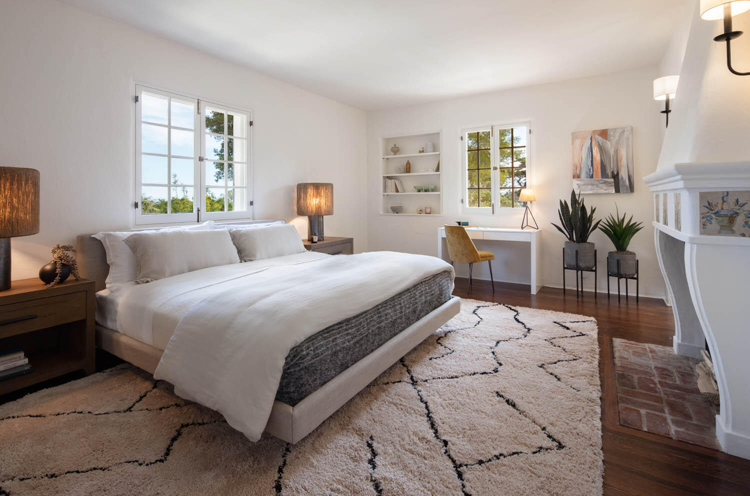770 Hot Springs Road Montecito, CA 93108 - Photo 16 of 33 a bedroom with double bed windows and a wooden floor