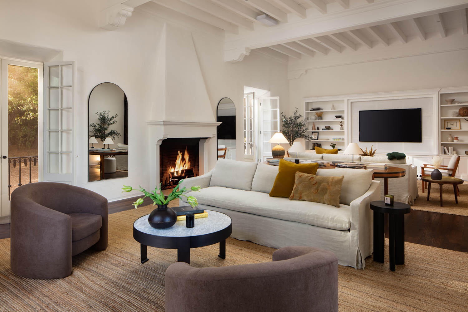 770 Hot Springs Road Montecito, CA 93108 - Photo 5 of 33 a living room with furniture a fireplace and a flat screen tv