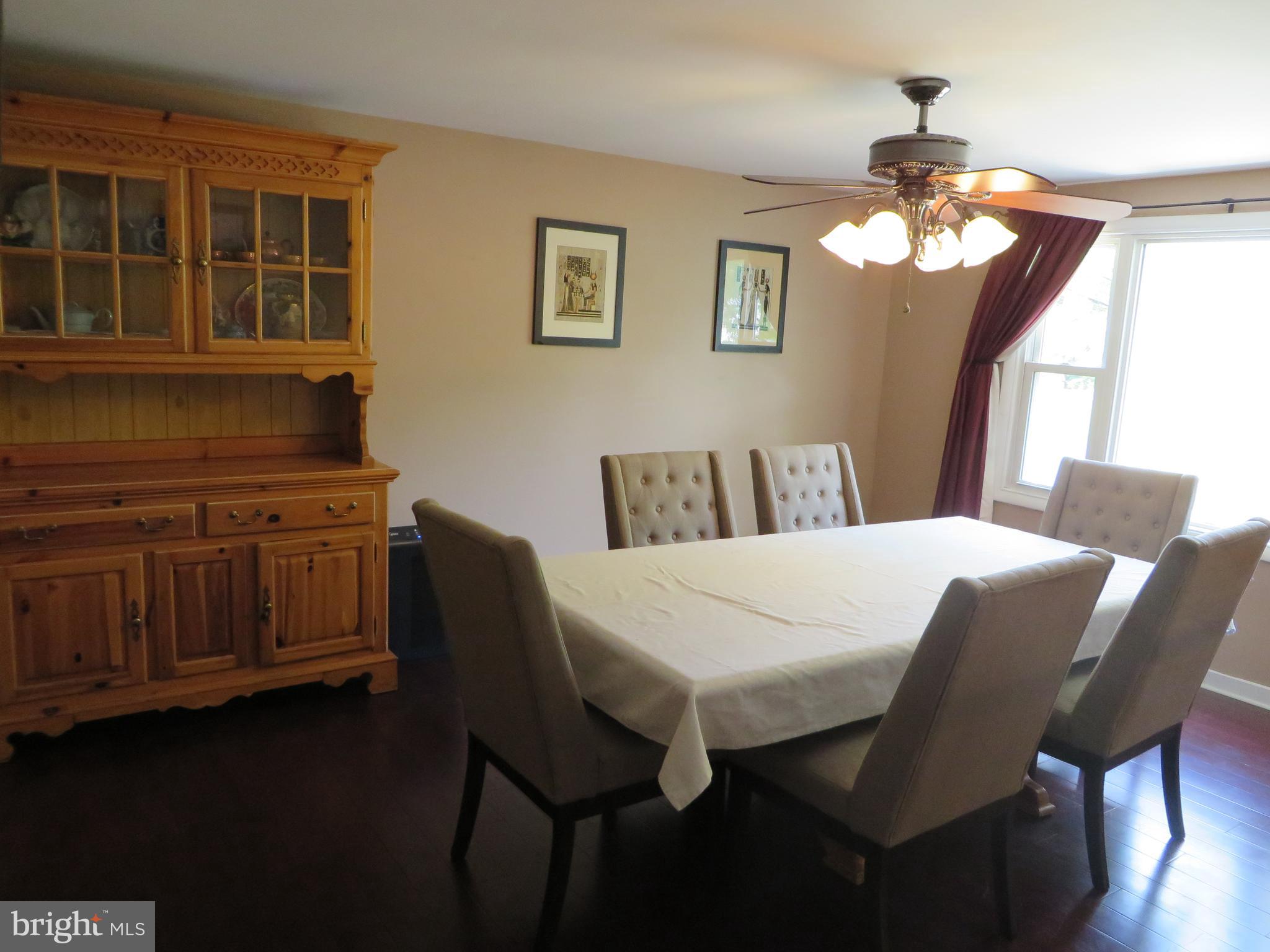 1331 Ava Road Severn, MD 21144 - Photo 14 of 65 Large windows light up dining/living space
