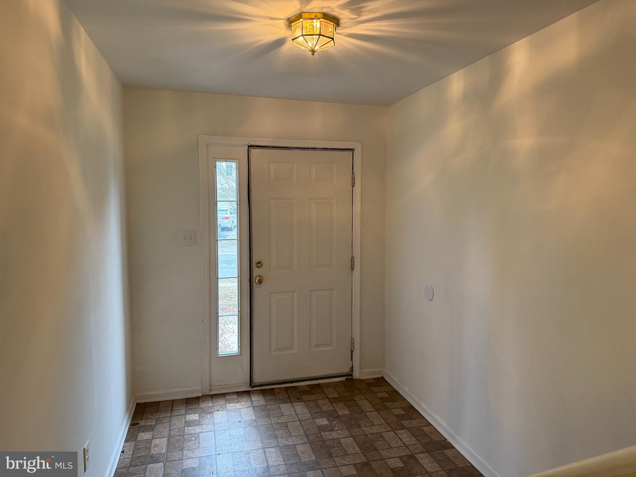 79 Mule Deer Court Elkton, MD 21921 - Photo 2 of 20 an empty room with wooden floor and fan