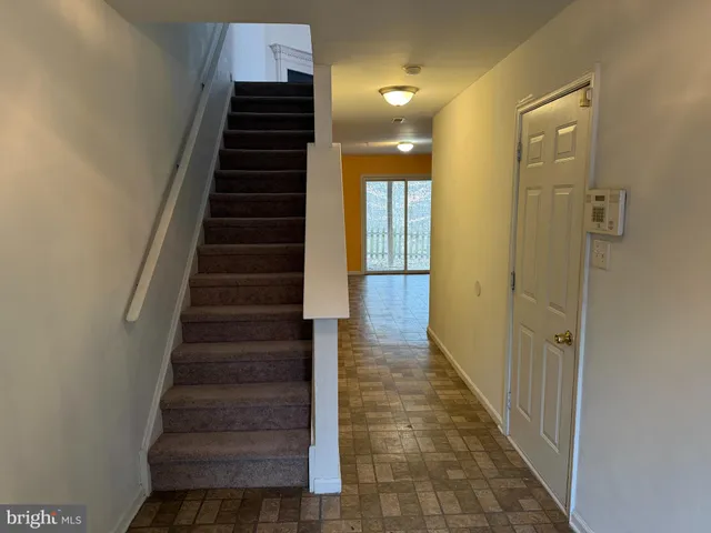 a view of hallway with stairs