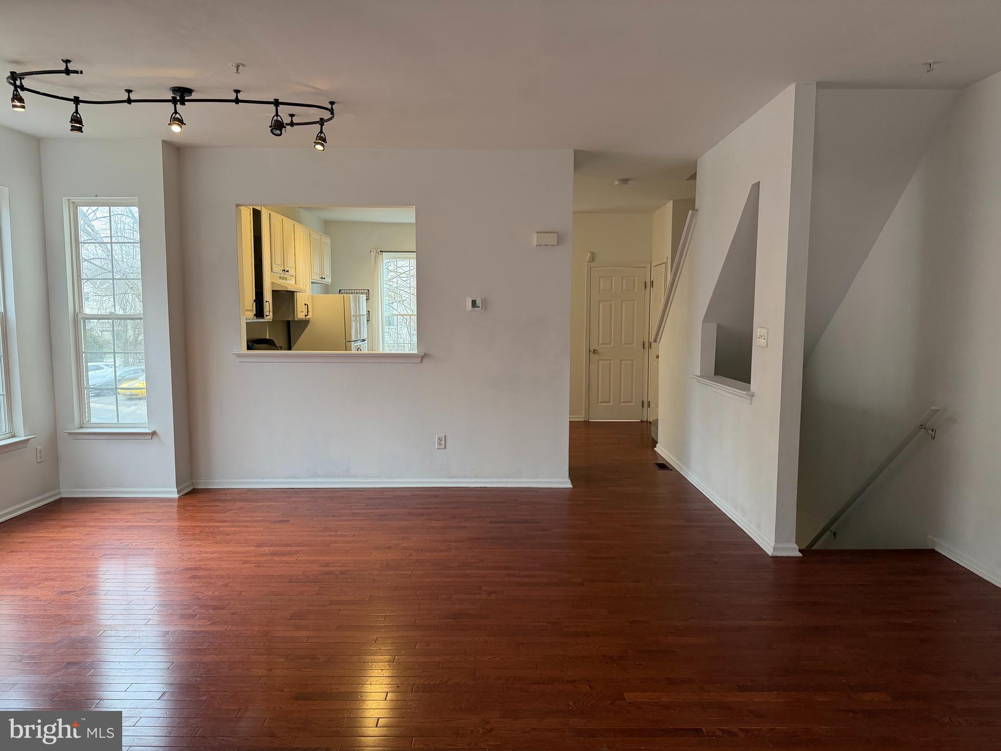 79 Mule Deer Court Elkton, MD 21921 - Photo 7 of 20 a view of a hallway with wooden floor and stairs