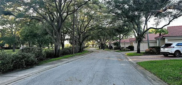 a view of road with trees