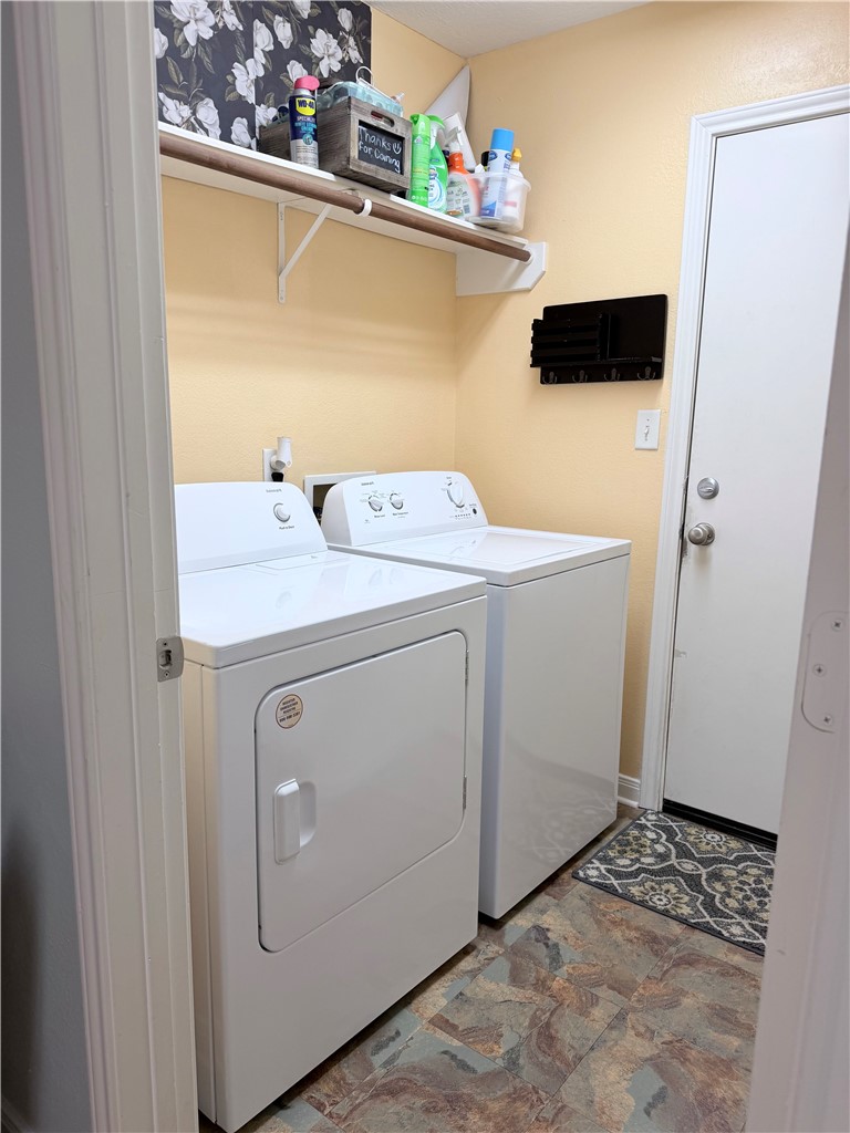 1029 Fallbrook Loop College Station, TX 77845 - Photo 27 of 34 a utility room with dryer and washer