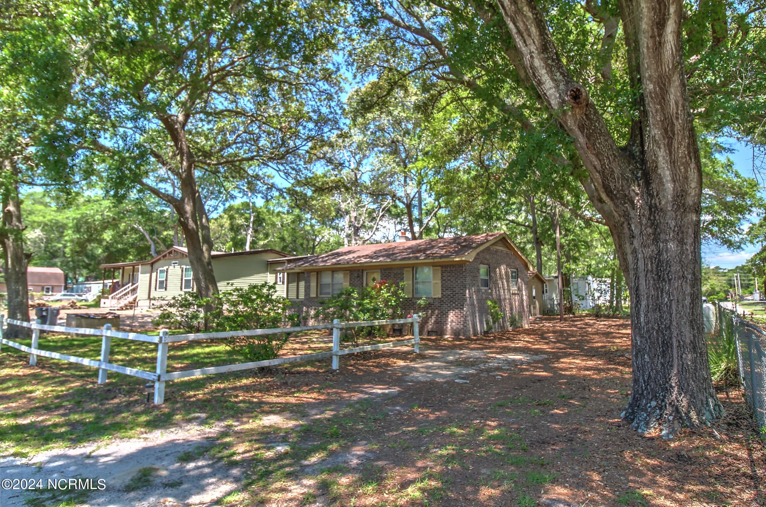 7259 Bo Tuck Road Southwest Ocean Isle Beach, NC 28469 - Photo 3 of 15 House Front 2