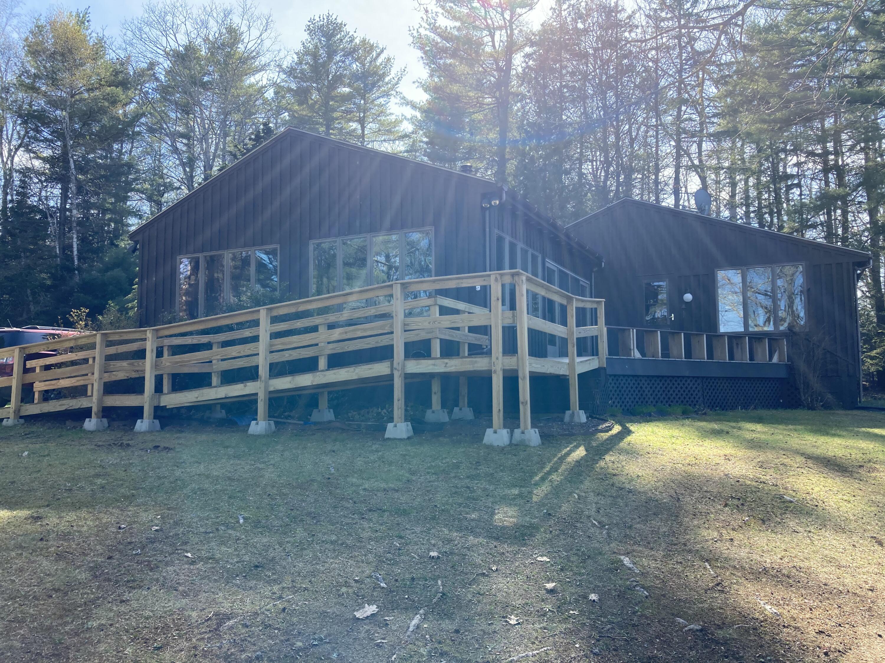32 Taunton Keep Hancock, ME 04640 - Photo 20 of 25 Ramp to deck from yard.