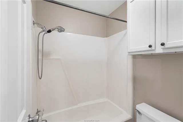 a view of a room with racks on the wall