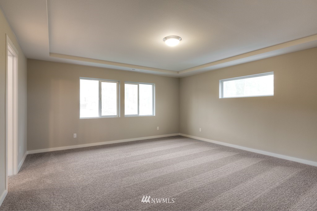 2125 228th Place Southwest, Unit EP12 Bothell, WA 98021 - Photo 11 of 16 a view of an empty room with a window