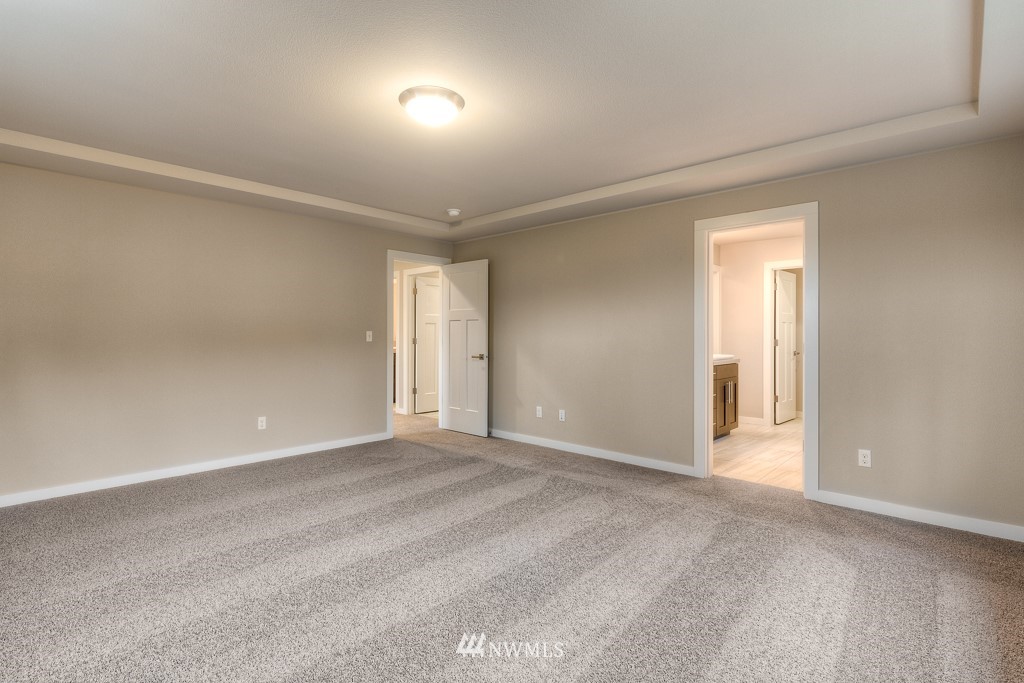 2125 228th Place Southwest, Unit EP12 Bothell, WA 98021 - Photo 12 of 16 a view of an empty room