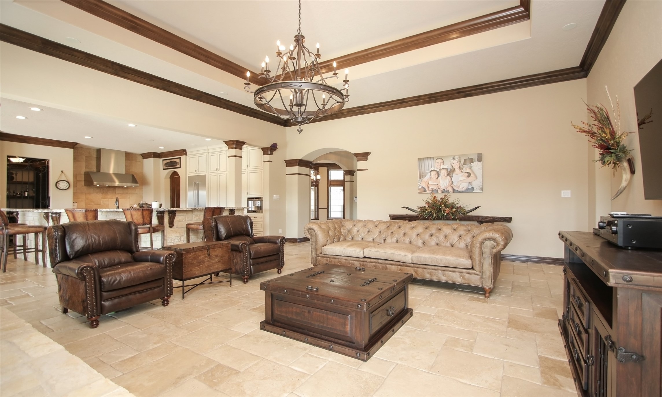 624 High Meadow Ranch Drive Magnolia, TX 77355 - Photo 42 of 42 a living room with furniture ceiling fan and a rug