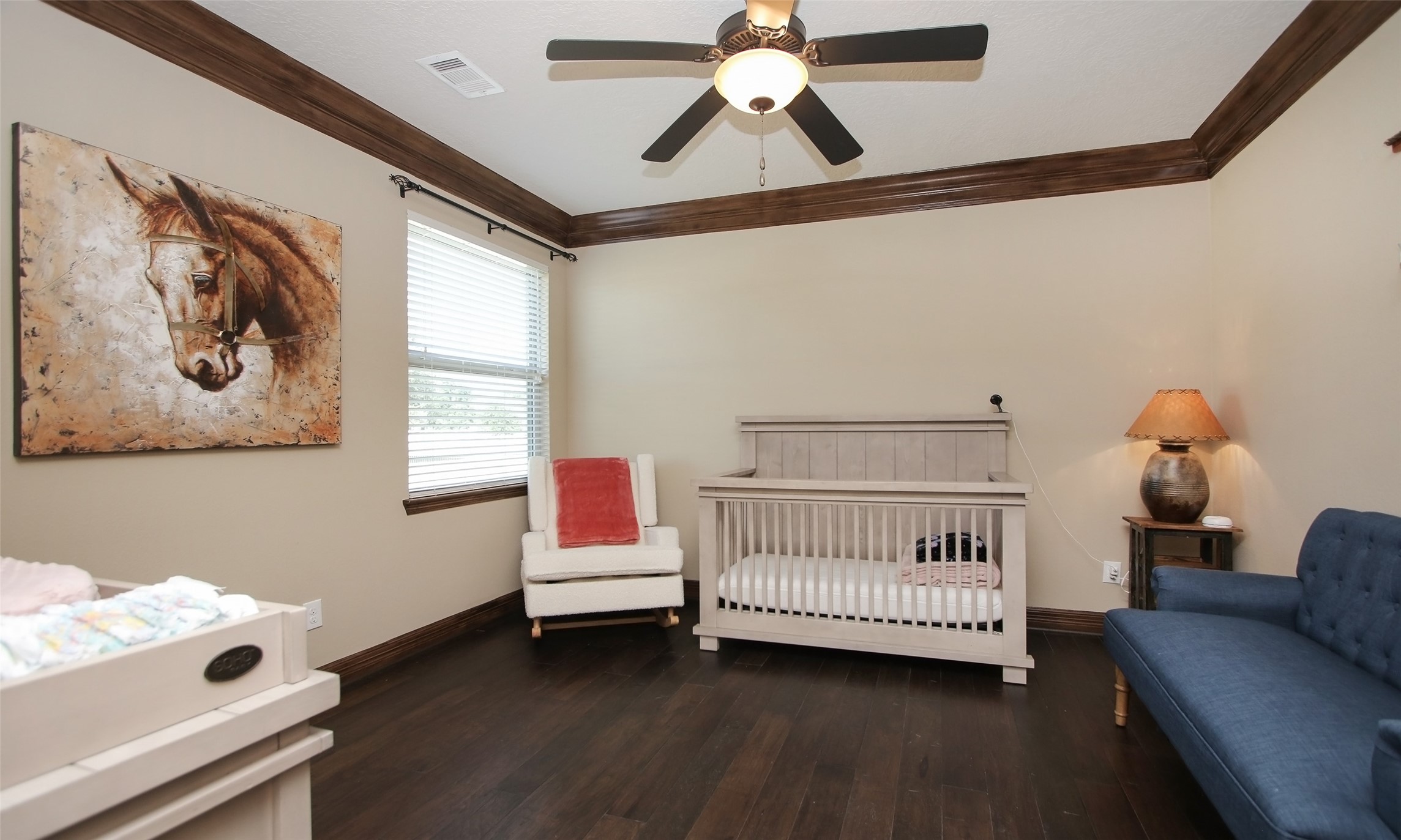 624 High Meadow Ranch Drive Magnolia, TX 77355 - Photo 23 of 42 a bedroom with a bed and a window
