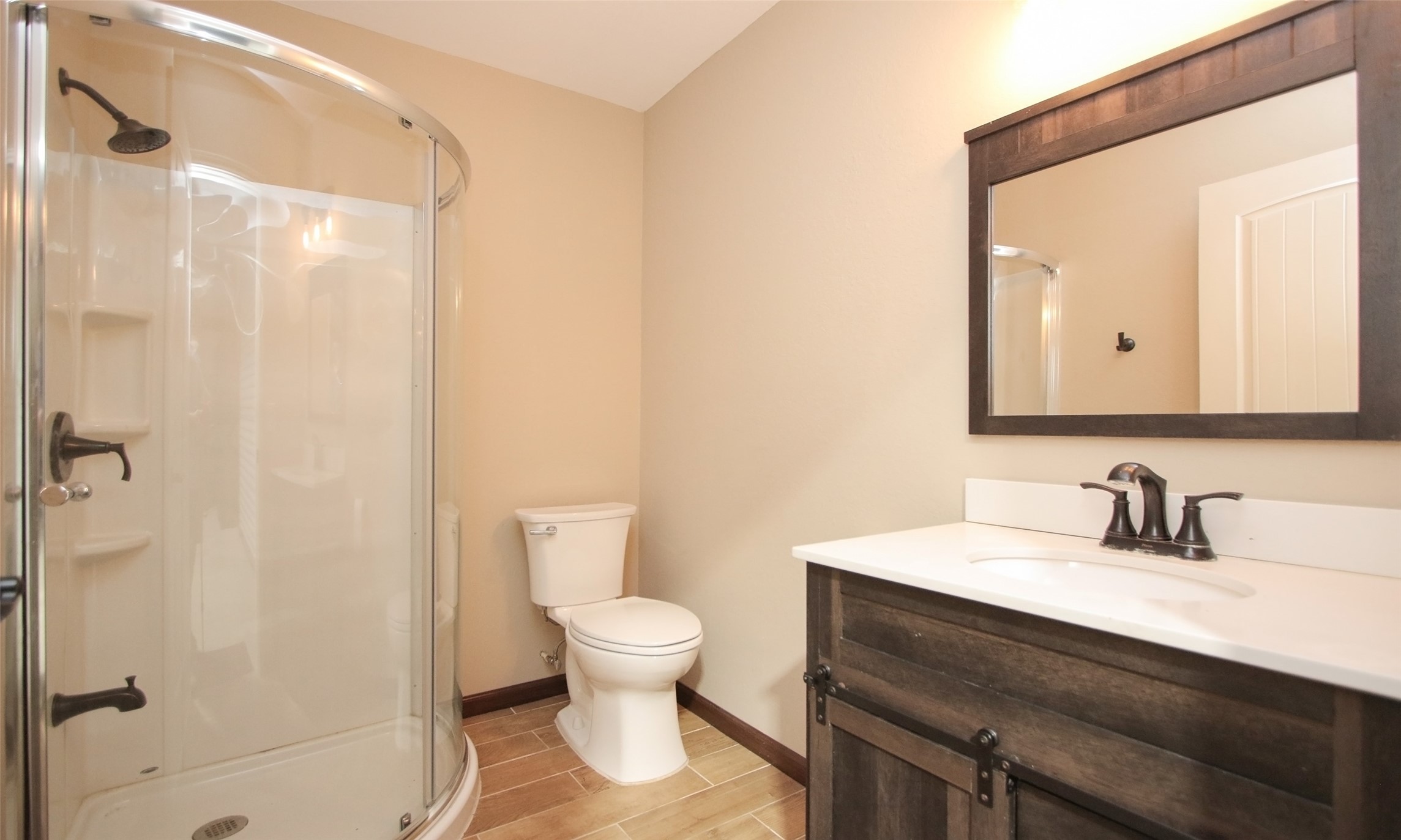 624 High Meadow Ranch Drive Magnolia, TX 77355 - Photo 39 of 42 a bathroom with a sink and a mirror