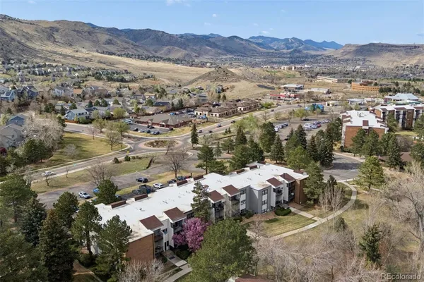 an aerial view of residential house with sandy dunes